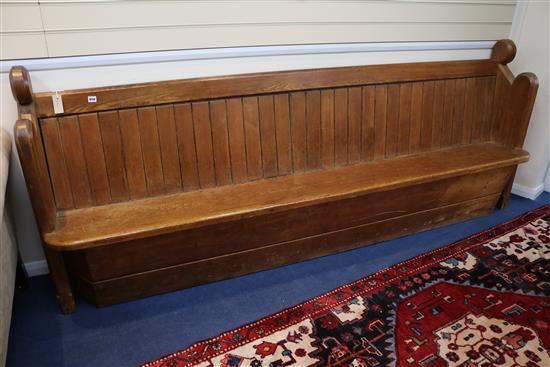 A pine church pew L.250cm
